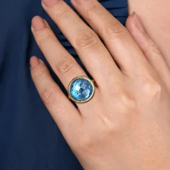 Gabriel & Co. 14K Yellow Gold Blue Topaz Round Shape Ladies Ring With Flower Pattern J-Back