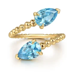 Best Gabriel & Co. 14K Yellow Gold Bujukan Blue Topaz Bypass Ladies Ring