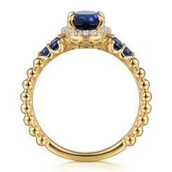 Best Gabriel & Co. 14K Yellow Gold Bujukan Diamond Halo and Oval Blue Sapphire Fashion Ring