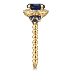 Best Gabriel & Co. 14K Yellow Gold Bujukan Diamond Halo and Oval Blue Sapphire Fashion Ring